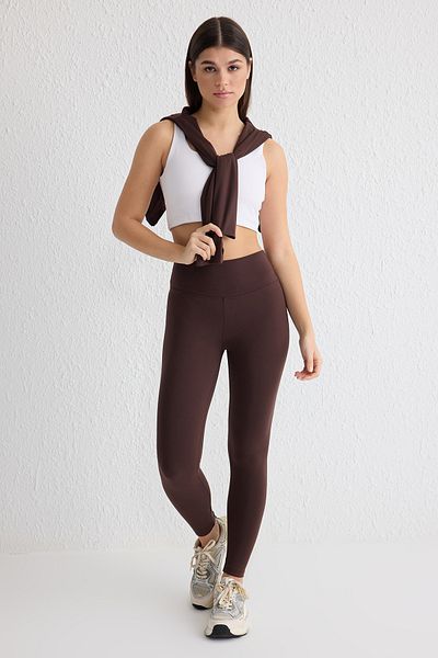 Trendyol Collection Weiche, gebürstete, braune Strick-Sport-Leggings – Reflektor-Druck-Detail, volle Länge THMAW25TY00020