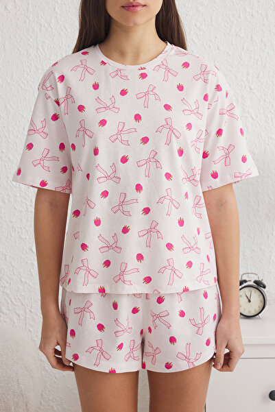 Trendyol Collection Světle růžová sada pleteného pyžama z jednoho žerzeje s potiskem Thmss25Pt00160