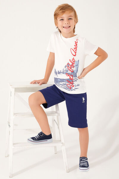 U.S. Polo Assn. بدلة برمودا للأولاد باللون الأبيض بتفاصيل مميزة من Assn