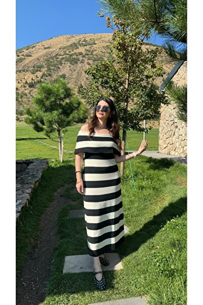 Butik Düşük omuz madonna yaka siyah çizgili triko uzun elbise