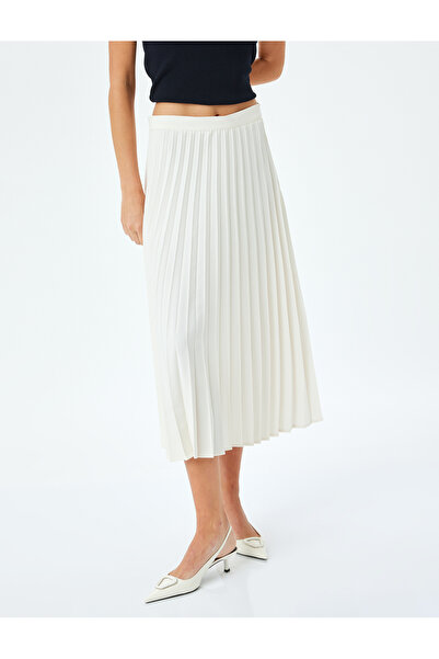 Koton Crepe fabric medium rise midi pleated skirt.