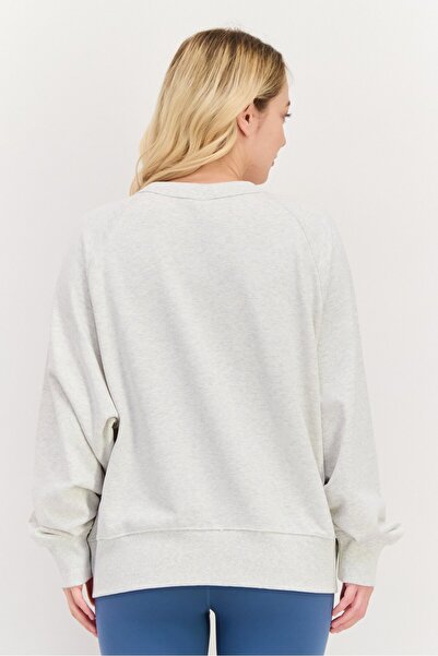 New Balance Women Sportswear Fit Long Sleeve Training Sweatshirt, Beige