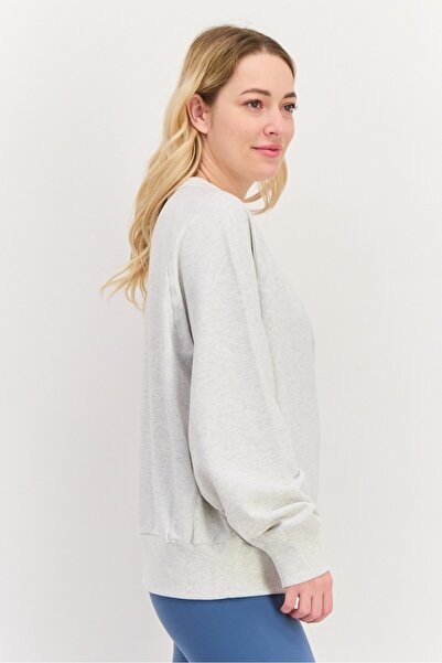 New Balance Women Sportswear Fit Long Sleeve Training Sweatshirt, Beige