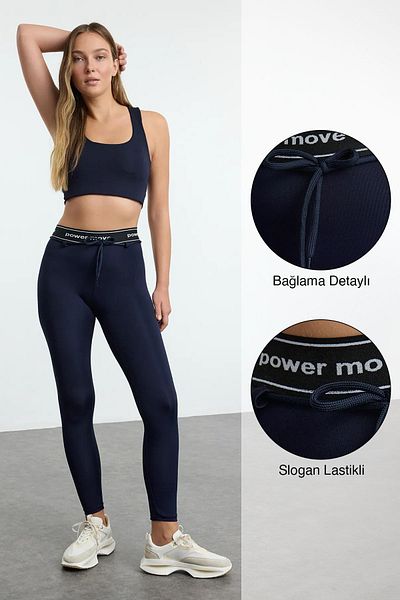 Trendyol Collection Dunkelblaue, gestrickte Sport-Leggings in voller Länge – Schnürung und Slogan-Gummidetails THMAW25TY00016