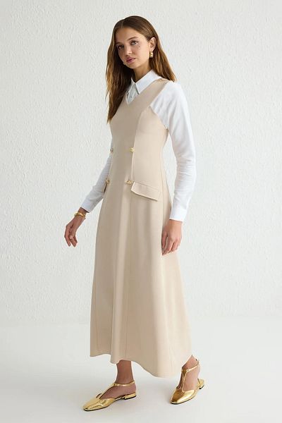 Trendyol Modest Beigefarbenes Giletkleid aus gewebtem Stoff TCTSS25EB00026