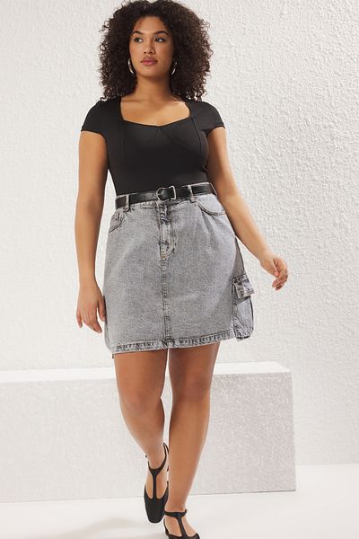 Trendyol Curve Μαύρη πλεκτή μπλούζα Plus Size TBBSS25AF00003