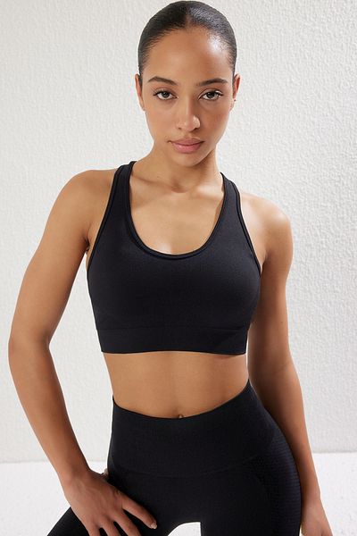 Trendyol Collection Seamless Black Knitted Sports Bra - Halter Neck with Support & Shape Thmss25Ss00015