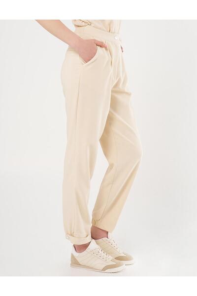 KYR Cream Colored Carrot Cut Elastic Trousers