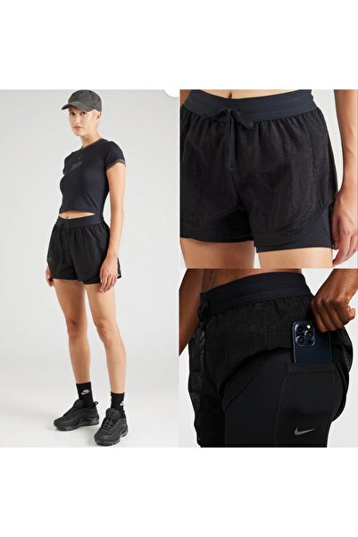 Nike Running Division
Dri-FIT Normal Belli 8 cm 2'si 1 Arada Kadın Şortu FB63...