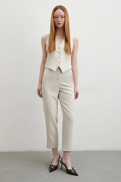 Never more Παντελόνι από στενό ύφασμα σε μπεζ χρώμα - Με πέτο στο μπροστινό μέρος