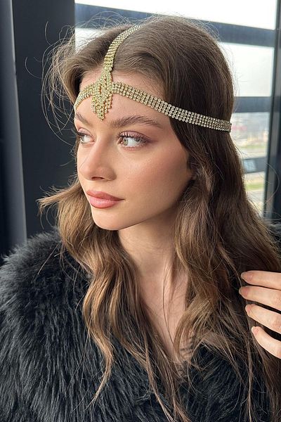 TAKIŞTIR إكسسوار حجري ذهبي اللون مفصل