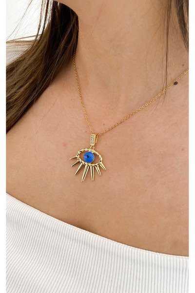Sacha Accessories قلادة من الفولاذ الذهبي مع شكل العين