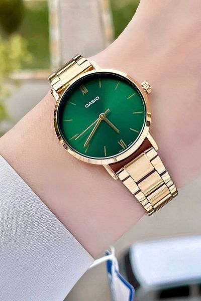 Casio Women's Gold Color Women's Watch with Green Cords