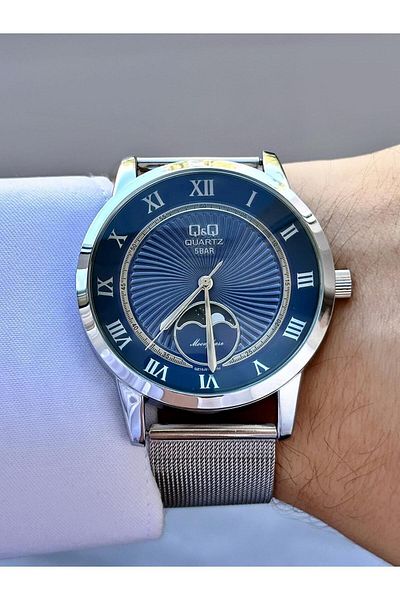 Q&Q Men's Blue Moving Detail Dial Silver Mesh Cord Analog Watch