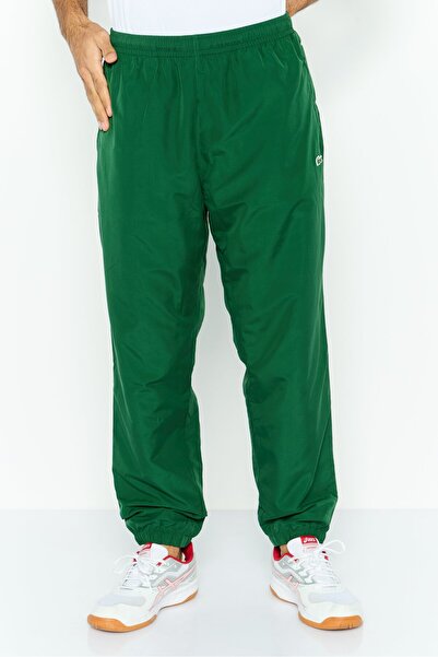 Lacoste بنطال رياضي رجالي بقصّة عادية وشعار العلامة التجارية، باللون الأخضر