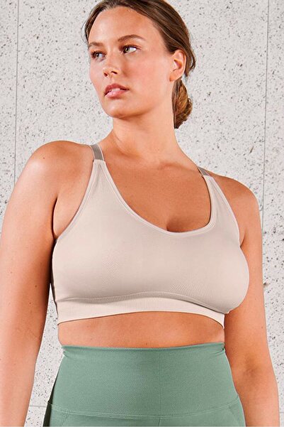 Tchibo حمالة صدر رياضية مبطنة بدون درزات للنساء، لون بيج