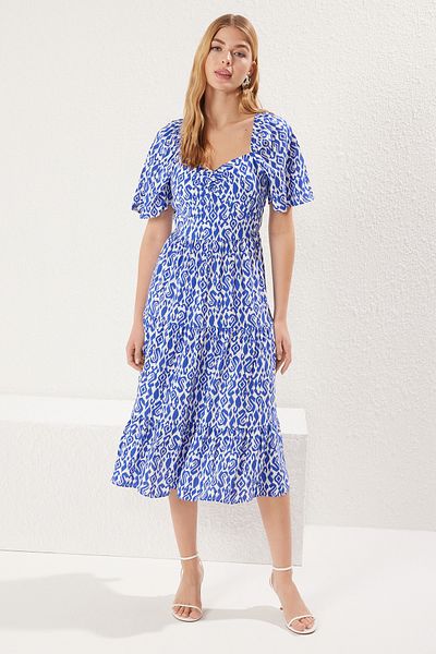 Trendyol Collection Weißes, ethnisches, gemustertes A-Linien-Midikleid mit Ballonärmeln und Blumendruck TWOSS20EL2323