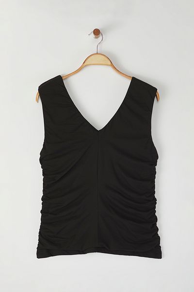 Trendyol Curve Schwarze gestrickte Plus-Size-Bluse