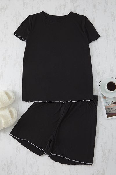 Trendyol Curve Schwarzes Baby-Overlock-Pyjama-Set mit detaillierten Strickmustern TBBSS25AI00030