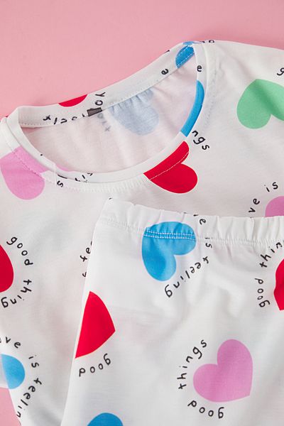 TRENDYOLKIDS Ecru Dievčenské pletené pyžamá so vzorom srdca Tkdss25Pt00006