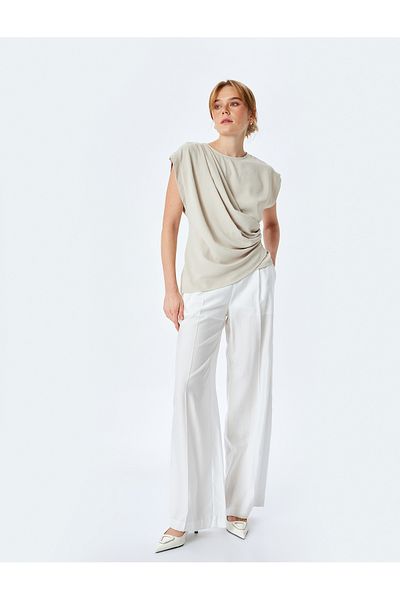 Koton Asymmetrische zweireihige Bluse mit Rundhalsausschnitt und drapiertem Detail