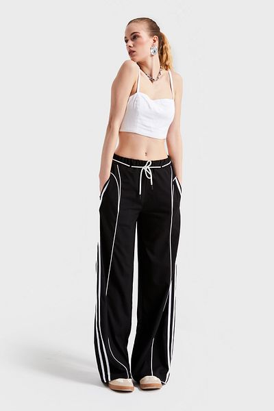 its basic Women's Black Color Stripe Detailed Lace up Comfortable Fabric Design Trousers
