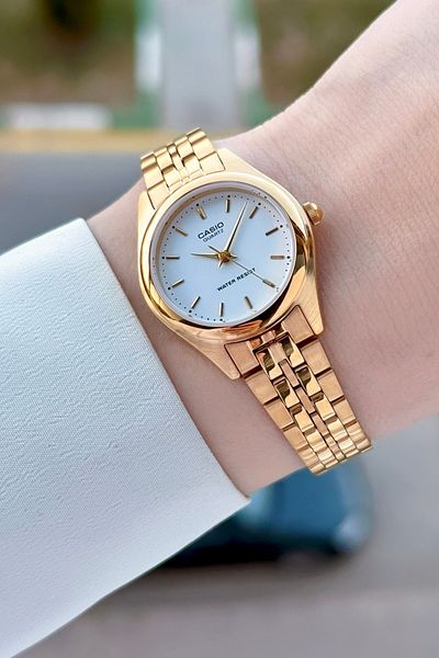 Casio Women's Gold Color Women's Wristwatch with White Cord