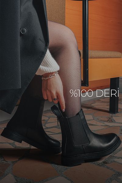 Marjin Damenstiefel aus echtem Leder mit elastischem Seitenband, Alltagsstiefel Kater Schwarz