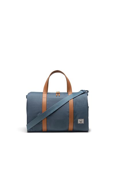 Herschel Supply Co. Modrá cestovná taška Herschel Novel™ Carry On Duffle Blue Mirage/White Stitch
