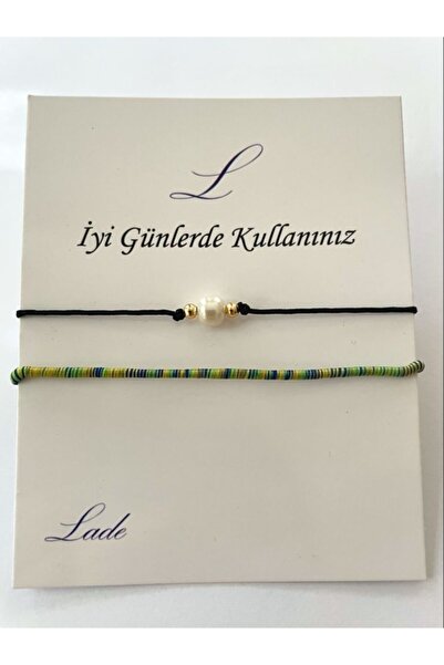 Lade سوار أسود مع تفاصيل اللؤلؤ