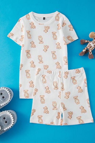 TRENDYOLKIDS Wielokolorowy dziewczęcy zestaw piżam z nadrukiem misia Tkdss25Pt00012