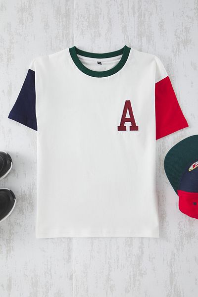 TRENDYOLKIDS Dětské vyšívané pletené tričko Ecru Color Block Unisex TKDSS25TS00066