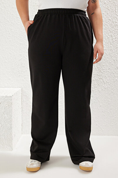 Trendyol Curve Černé široké střihové tenké pletené tepláky větší velikosti Tbbaw23Aj00007