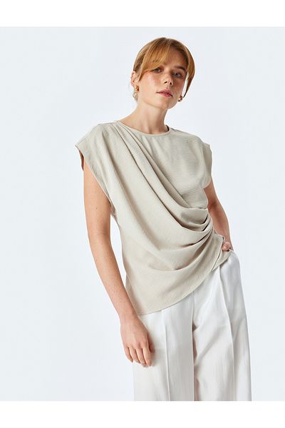 Koton Asymmetrische zweireihige Bluse mit Rundhalsausschnitt und drapiertem Detail