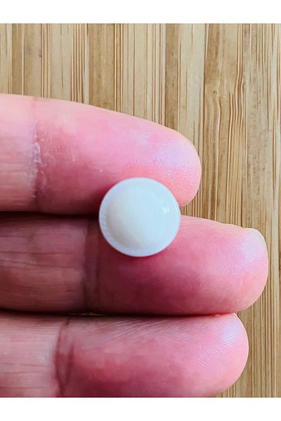 Öztürk Cream Baby Button with a Stitch from the Bottom. 13mm. Half Pearl Shaped.