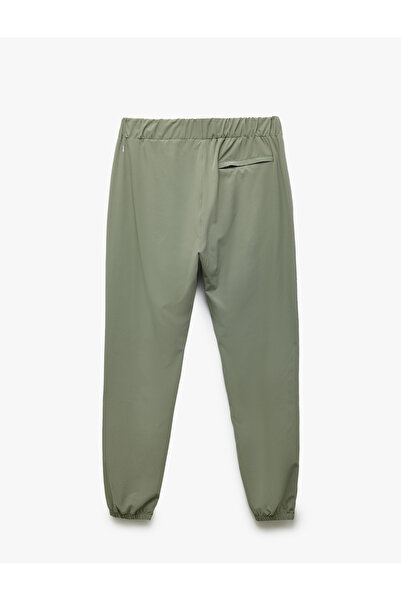 Koton Αλεξίπτωτο υφασμάτινο Jogger Sports Sweatpants με λεπτομέρεια τσέπης με φερμουάρ και ελαστική μέση