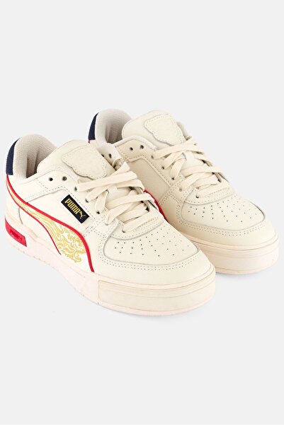 Puma حذاء كلاسيكي للأولاد من ماركة تايجر للأنشطة الخارجية، لون بيج