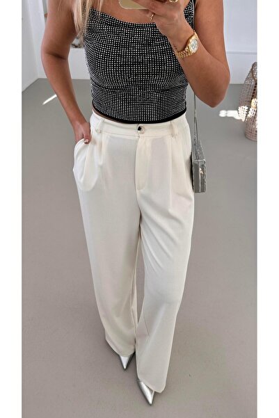 Sezgi Tekin Pilise Деталі Білі широкі штани-палаццо