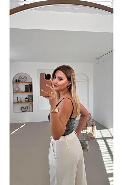 Sezgi Tekin Pilise Деталі Білі широкі штани-палаццо