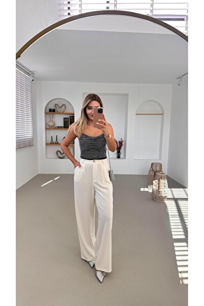 Sezgi Tekin Pilise Деталі Білі широкі штани-палаццо