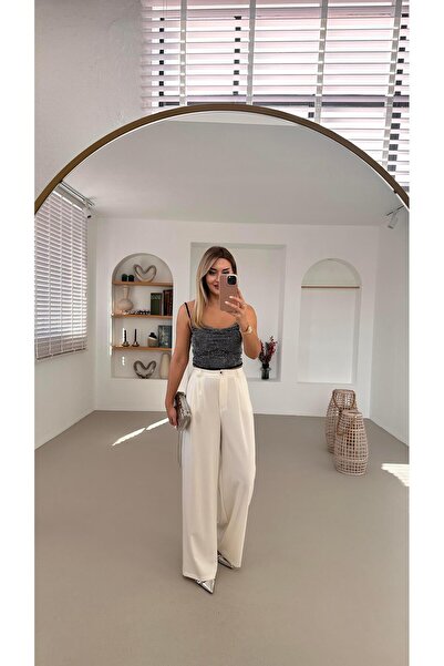 Sezgi Tekin Pilise Деталі Білі широкі штани-палаццо