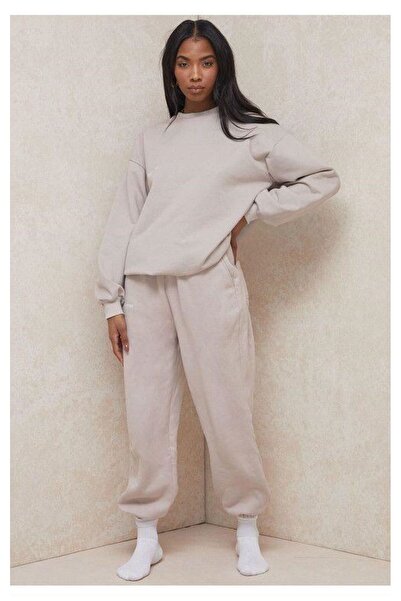 THE WHITE Γυναικείο φούτερ με λαστιχένια μπατζάκια σε μεγάλο μέγεθος σε μπεζ ...