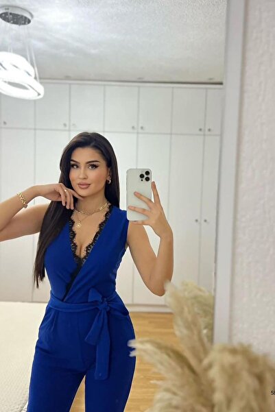 Deafox Saks Modrý krajkový overal z importovaného krepového materiálu s páskem