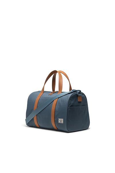 Herschel Supply Co. Modrá cestovná taška Herschel Novel™ Carry On Duffle Blue Mirage/White Stitch
