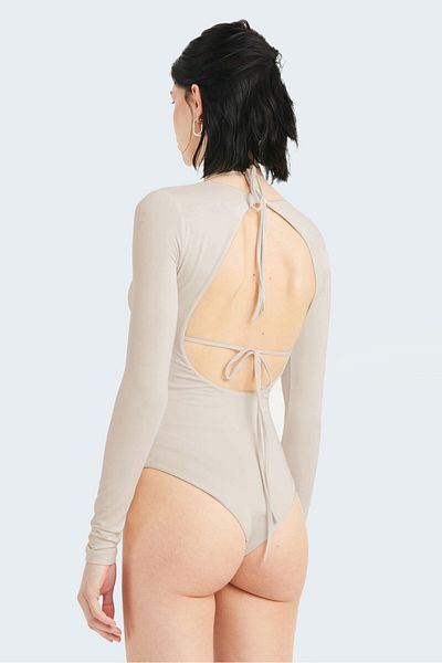 IAMNOTBASIC Beige Jade Bodysuit - an Elegant and Modern Choice