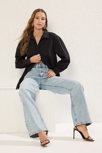 Trendyol Collection Blugi albastru deschis cu talie înaltă cu picioare late TWOSS25JE00058