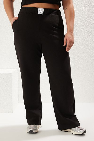 Trendyol Curve Schwarze Wide-Leg-Jogginghose in Übergröße mit Etikett „High Waist“ – TBBSS25AJ00001
