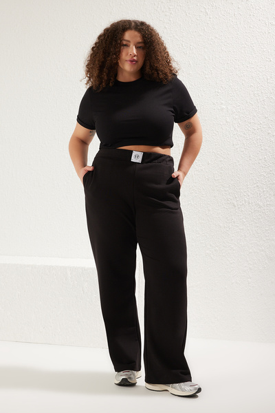 Trendyol Curve Černé široké tepláky velké velikosti s vysokým pasem - TBBSS25AJ00001