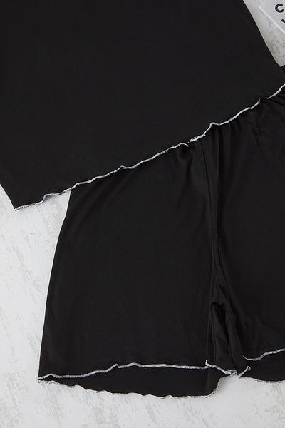 Trendyol Curve Schwarzes Baby-Overlock-Pyjama-Set mit detaillierten Strickmustern TBBSS25AI00030