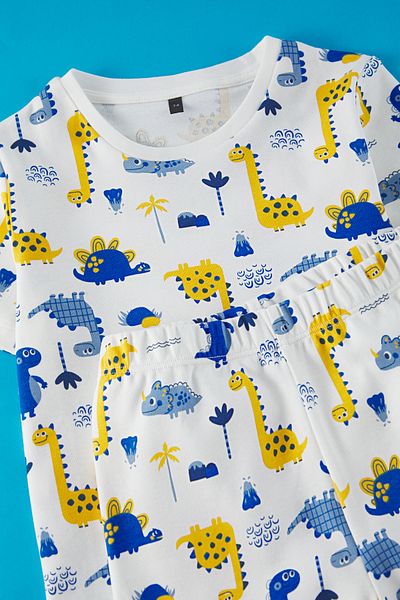 TRENDYOLKIDS Komplet piżamowy dla chłopców z nadrukiem dinozaurów z bawełny - TKDSS25PT00014